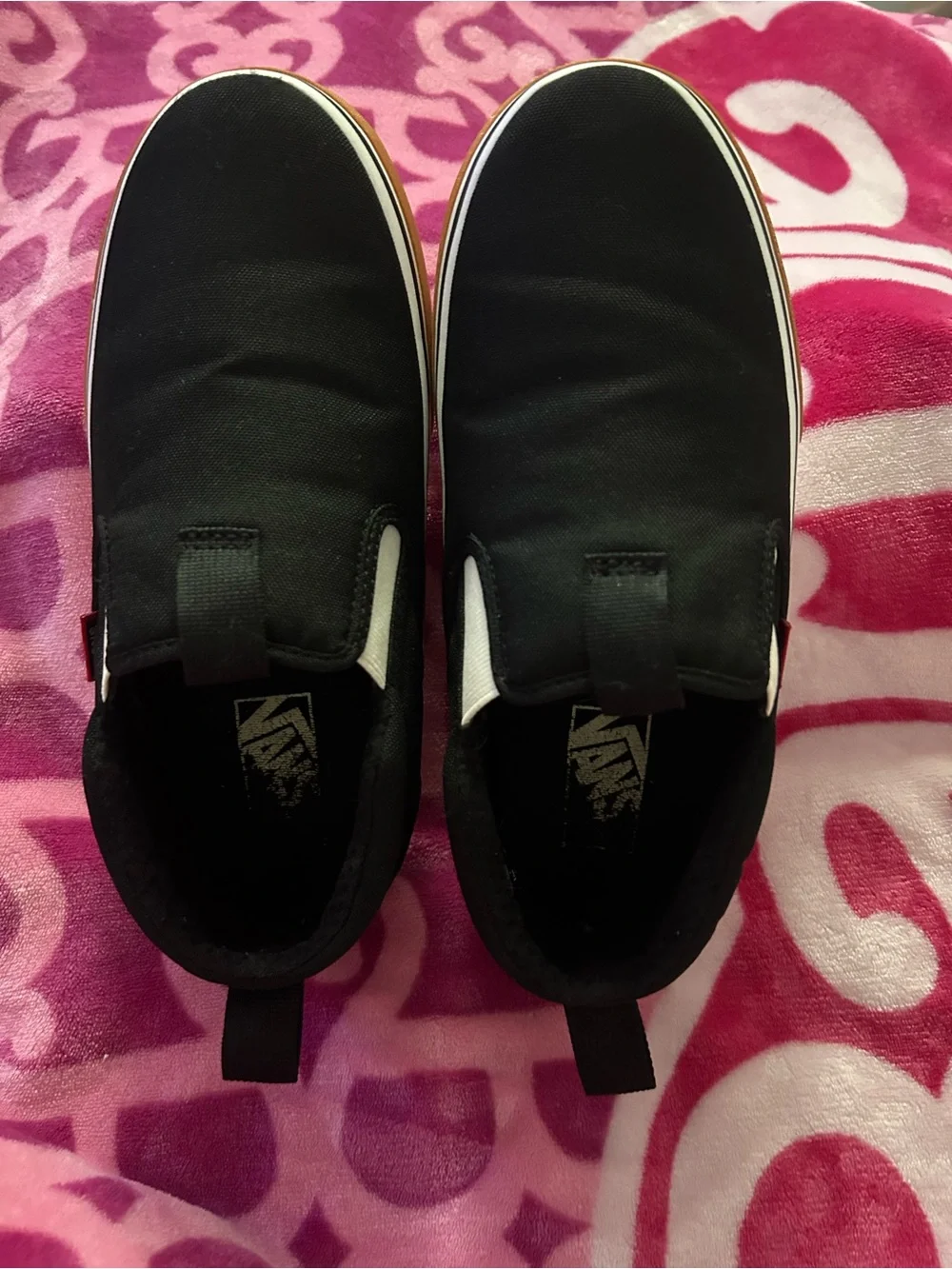 Vans Black Slip-On Sneakers with White Midsole and Gum Outsole